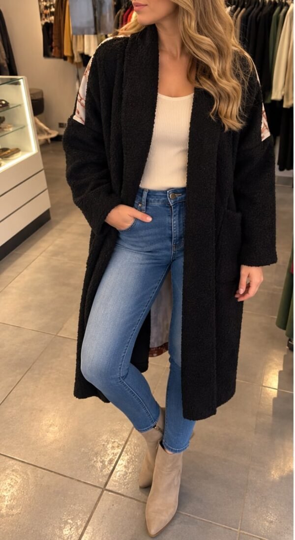 Manteau long noir, dos soleil
